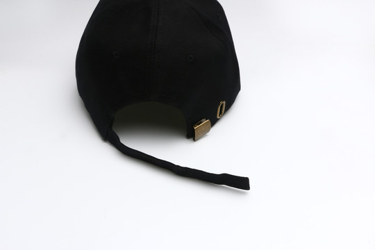 黑色帽子尾部摄影图