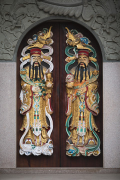 剪瓷雕门神