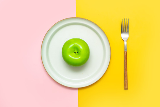 青苹果素食主义概念摄影图