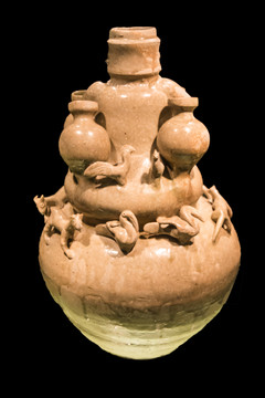 婺州窑青釉堆塑人物罐
