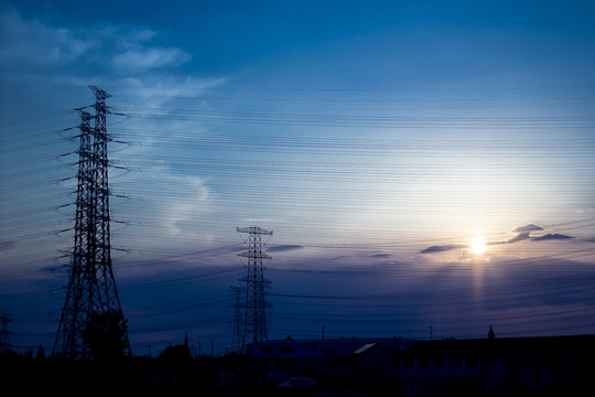 高压输电塔夕阳天空科技背景