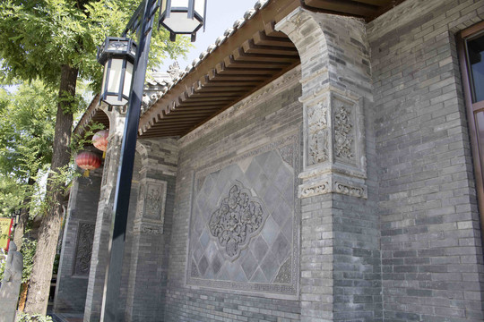 唐语新中式四合门楼大门砖雕设计