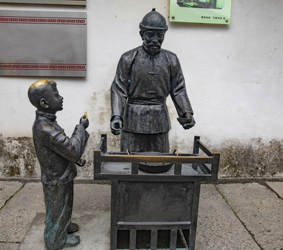 卖货小贩雕像