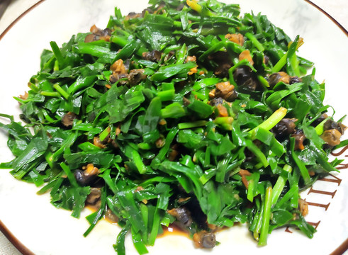 家常美食韭菜炒螺蛳肉