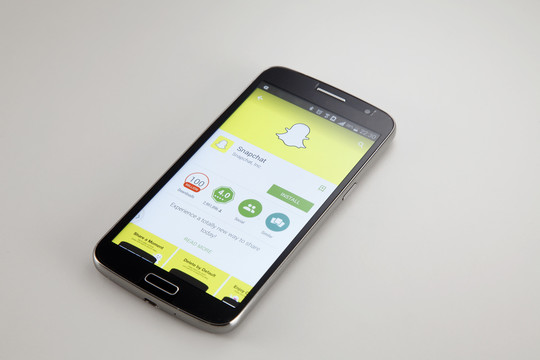 马来西亚吉隆坡-2015年4月2日。Snapchat于2011年9月发布，是一款流行的照片信息应用程
