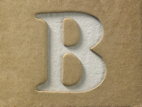 在棕色纸板上剪下字母b