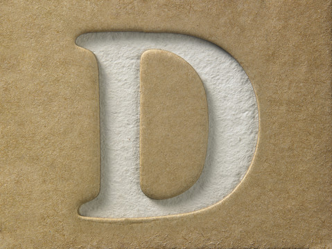 在棕色纸板上剪下字母d