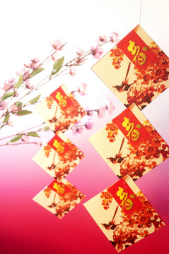 中国新年卡片和粉红色樱花与文字春天