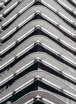 高楼建筑白色金属曲线外观设计摄影照