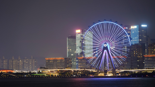 夜晚灯光欢乐港湾摩天轮滨海建筑