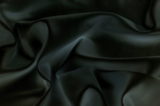 黑色丝绸拉丝褶皱布料背景