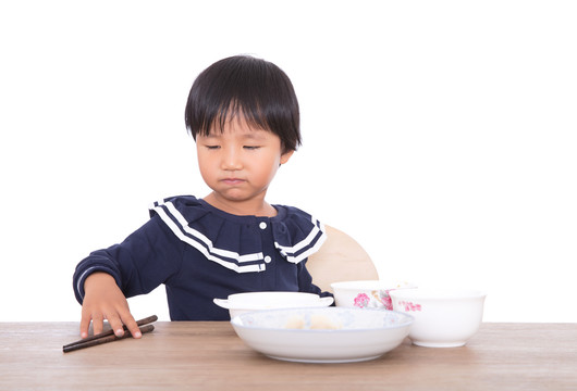 吃着饭连带卖萌的中国小女孩