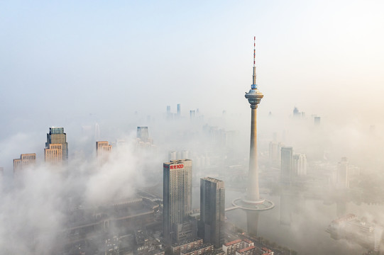 航拍云雾中的天津天塔地区