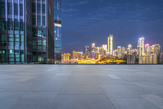 地砖地面和城市现代建筑夜景