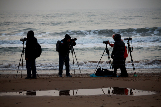 海边拍摄摄影爱好者