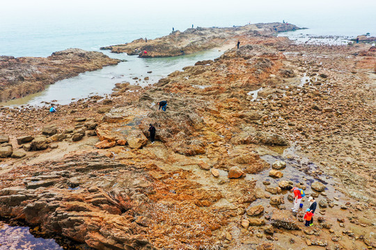 航拍山东青岛太平湾海岬角礁石