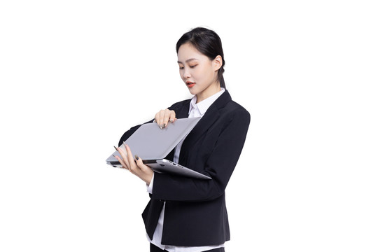 商务女性手持笔记本电脑