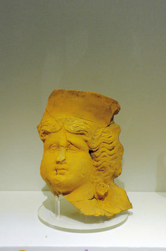 古罗马赤土陶戴大礼帽女子头像