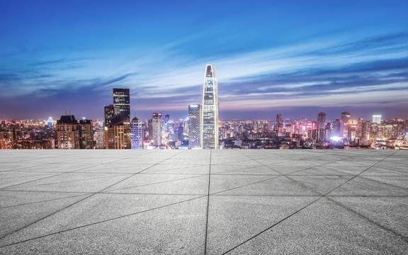 道路地面和城市建筑夜景