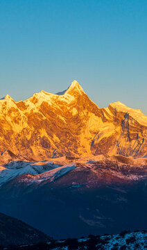 西藏南迦巴瓦雪山日落日照金山