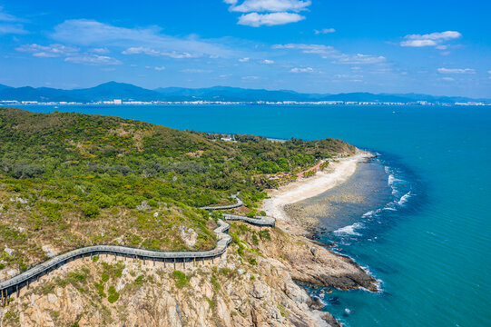 航拍三亚西岛海边山崖壁岩石