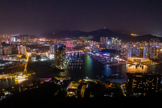 航拍海南三亚鸿洲游艇码头夜景