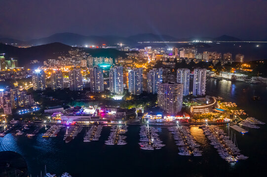 航拍海南三亚鸿洲游艇码头夜景