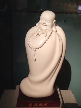 明代德化窑弥立坐像