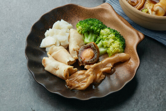 花胶海螺肉鲍汁捞饭