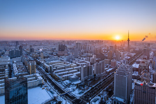 雪后中国哈尔滨夕阳下龙塔航拍