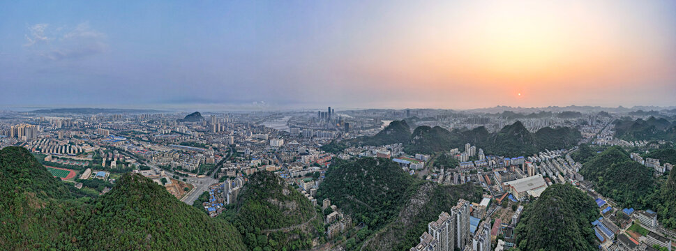 广西柳州城市清晨日出航拍全景图