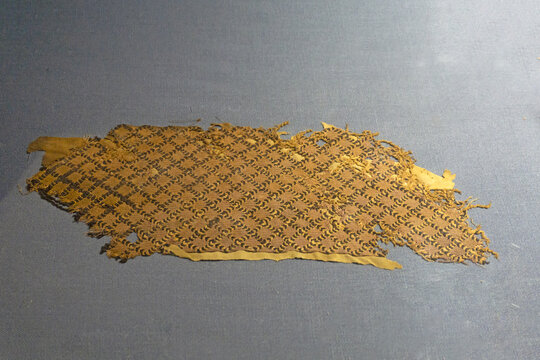 汉代棕黄菱格纹编织带