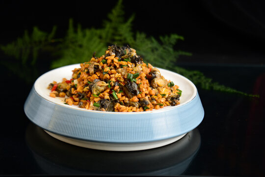 萝卜干炒螺肉