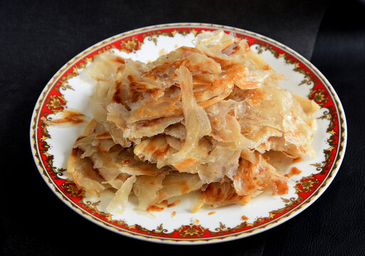砂窝鱼头手撕饼