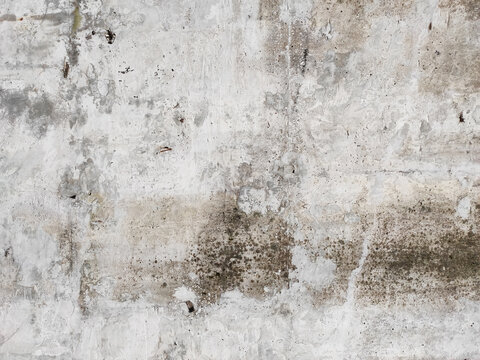 斑驳陈旧的灰白色水泥墙面