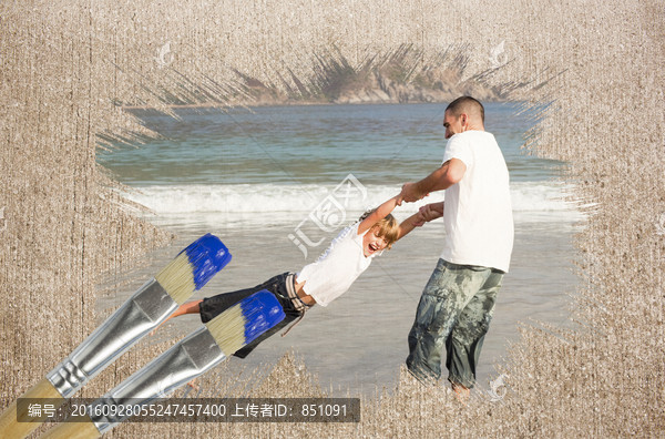 父子俩在沙滩上玩的复合形象