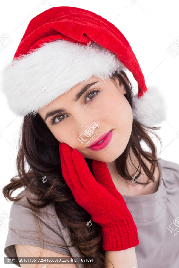 戴着圣诞帽子的年轻女人