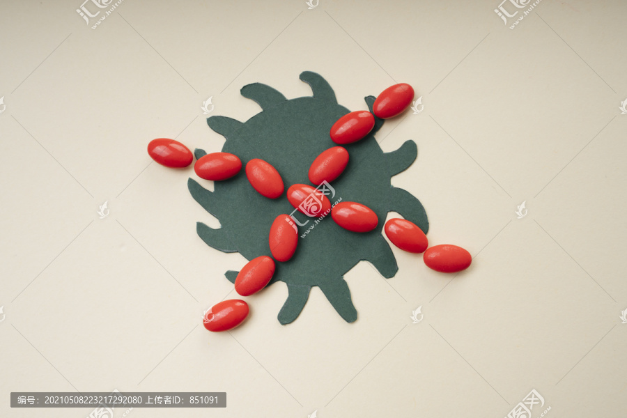 停止covid-19病毒概念。红十字会用药丸覆盖冠状病毒。