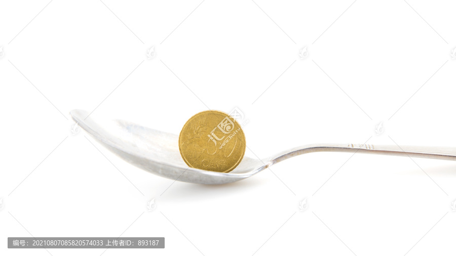 一把勺子和勺子里的一枚欧元硬币