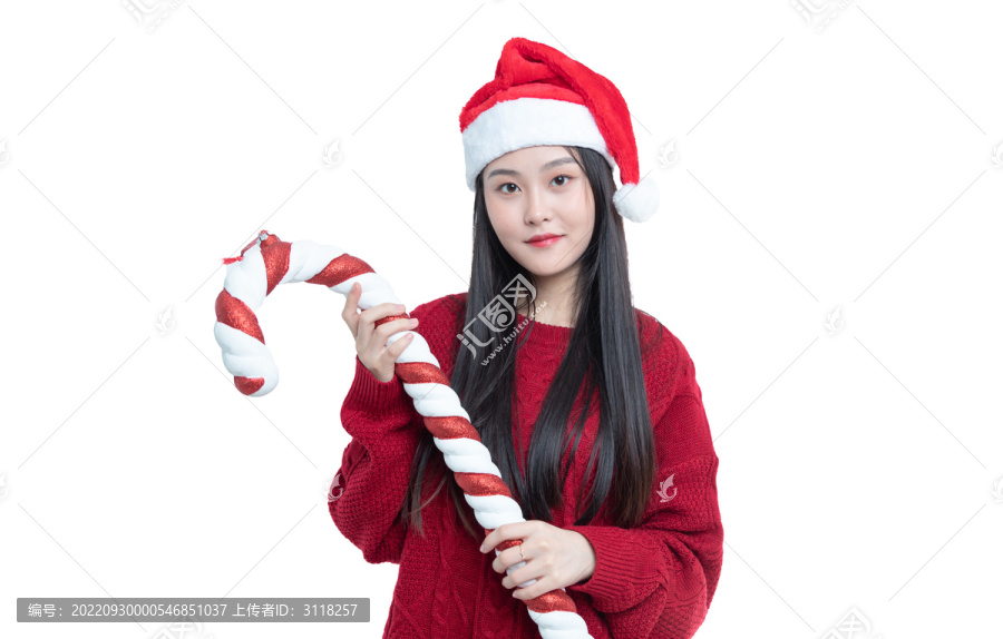 拿着圣诞节拐杖的美女